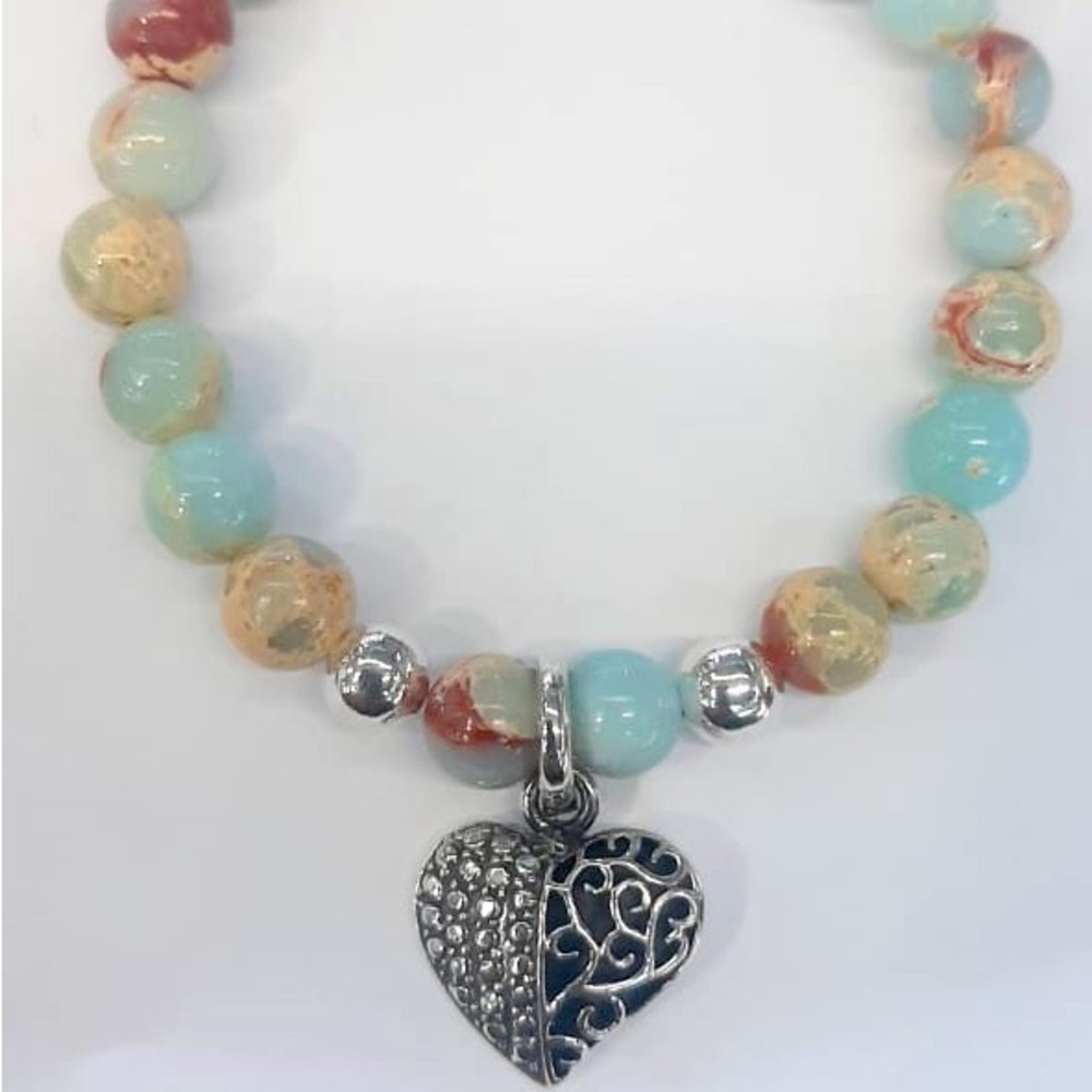 Im selling nice bracelet with charm 950 sterling silver.